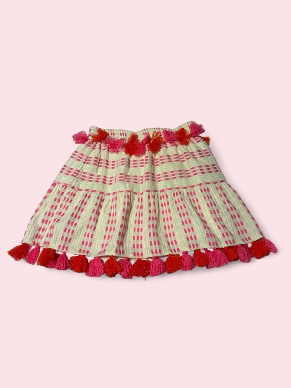 Tessora Cream Skirt with Pink and Red Tassel Trim